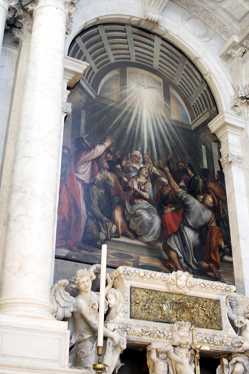 Titian's 1546 oil painting 'Pentecost' in Santa Maria della Salute, Venice, depicts the Descent of the Holy Spirit as tongues of fire upon the Virgin Mary and the gathered apostles