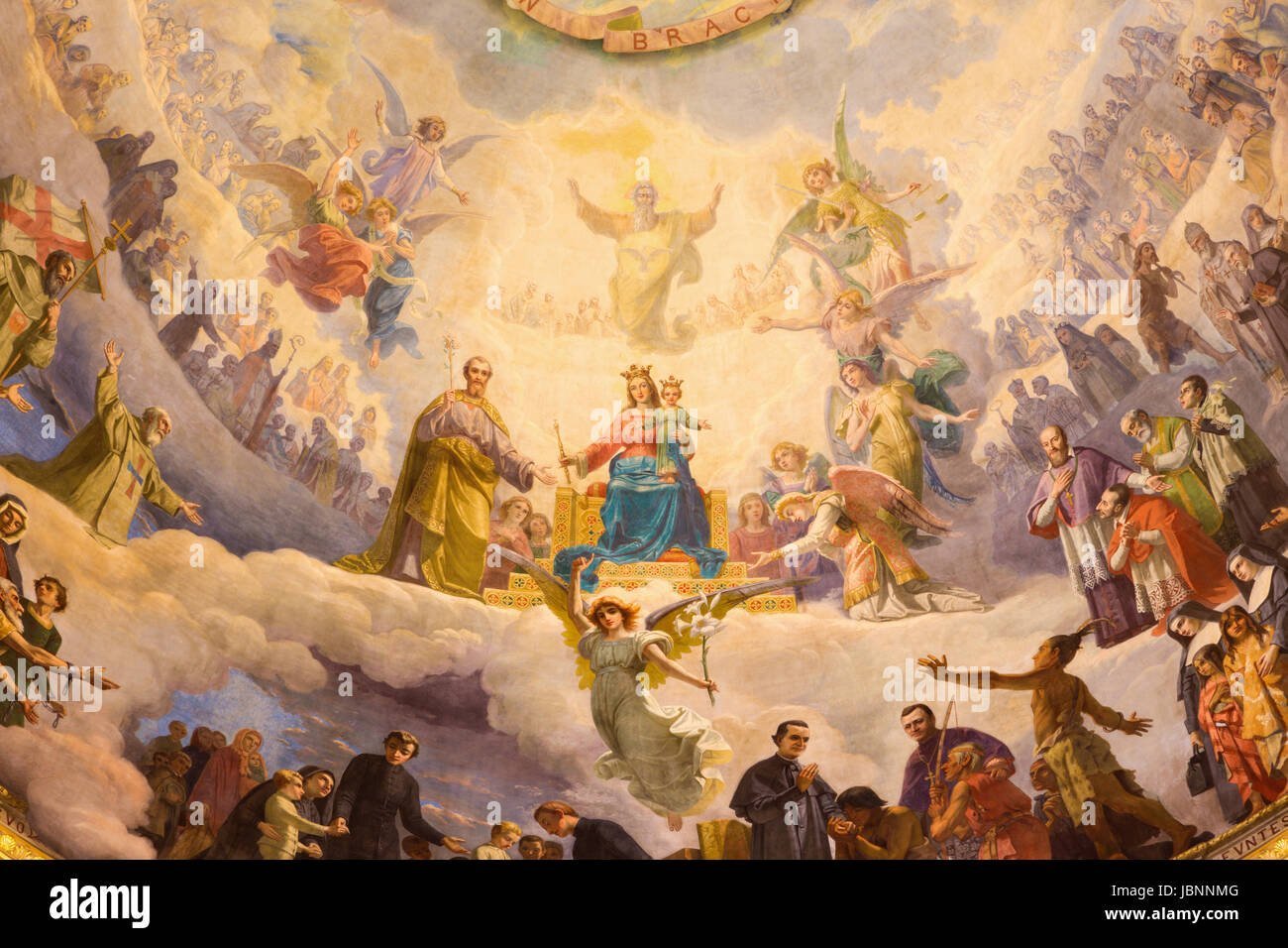 Giuseppe Rollini's 19th-century fresco 'Mary, Help of Christians' in Turin, Italy, depicts the Virgin Mary's Coronation as Queen of Heaven, presenting her as a powerful protector and intercessor for the faithful in the traditional Catholic iconographic style